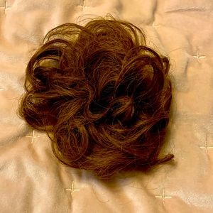 Messy Bun. Says light brown. I think it’s more of a ginger brown.